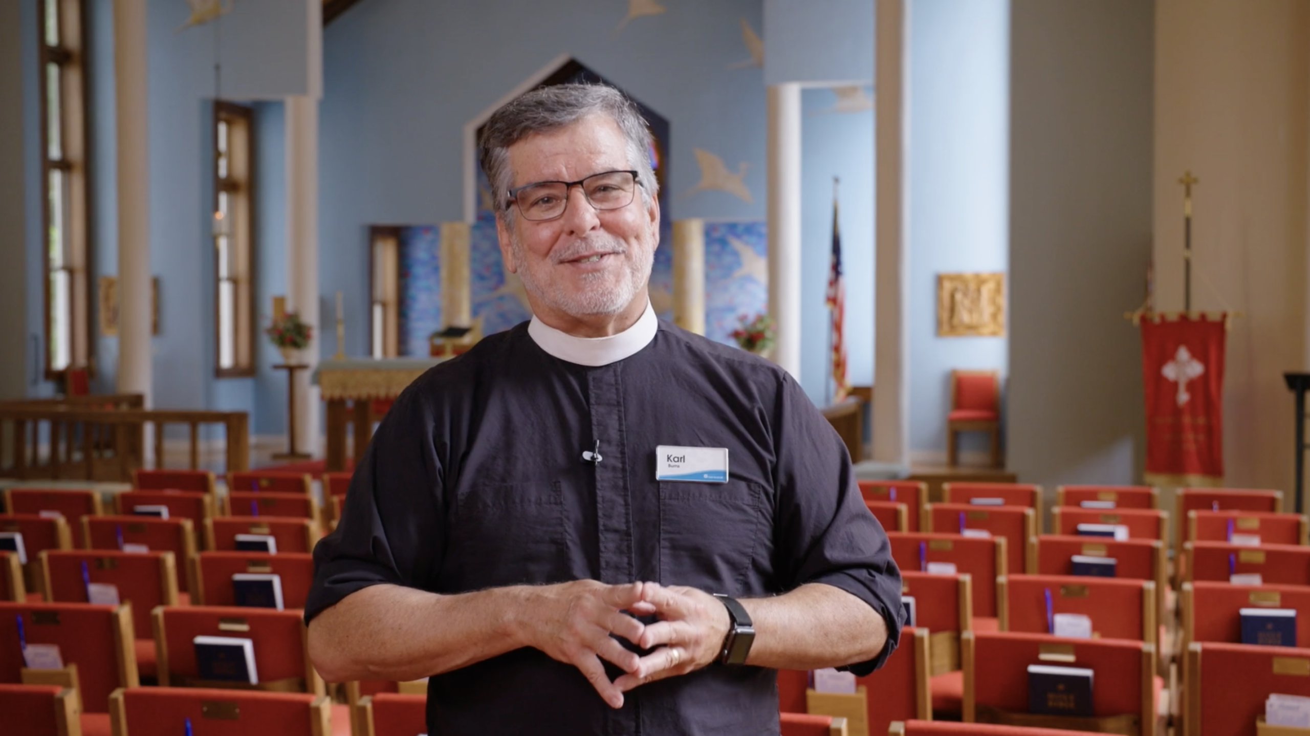 Church leader meeting with community member