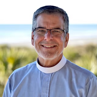 The Very Rev. Karl Burns, Rector